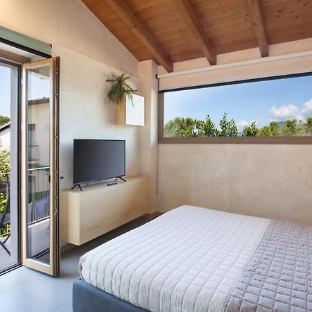 Residenza Vedovelli Aparthotel Тори дел Бенако Екстериор снимка